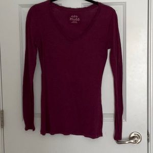 V-neck long sleeve Henley style T-shirt.